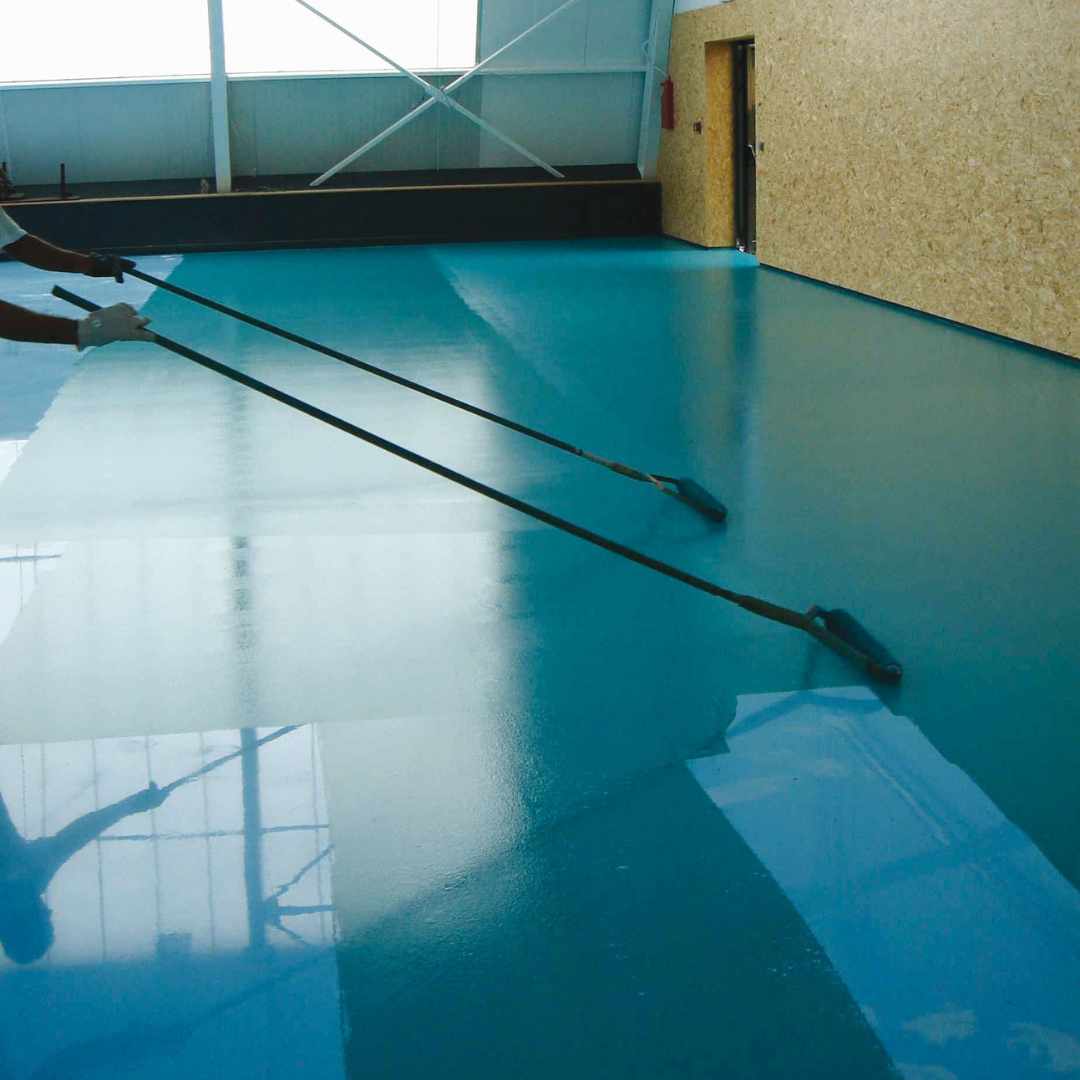 posa del sottofondo per piste d'atletica e pavimentazioni sportive